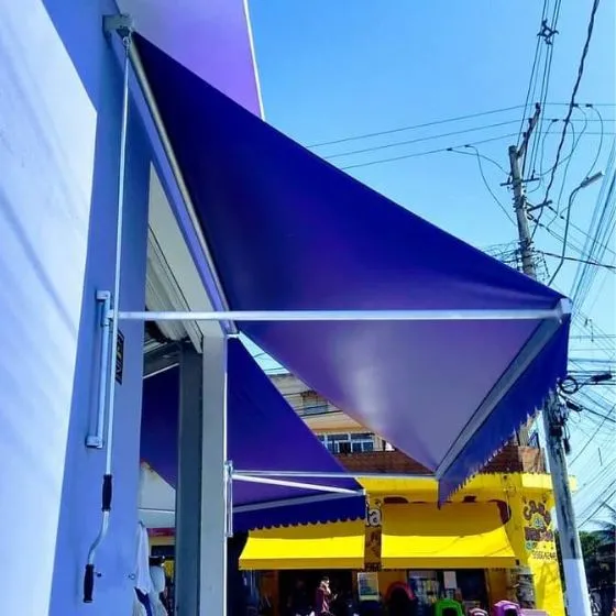Toldo Cortina com Braços Laterais em Rio Claro SP Toldo Cortina com Braços Laterais em Rio Claro SP — Instalação em garagem residencial